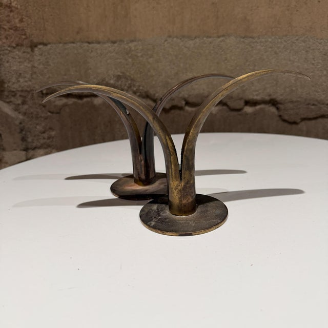 For your consideration, a pair of vintage "Lily" (Liljan) candle holders designed by Ivar Ålenius-Björk and manufactured...