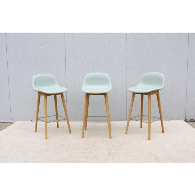 Fabulous set of 3 Fiber counter-height stools by Copenhagen-based design duo Iskos-Berlin for the Danish brand Muuto....