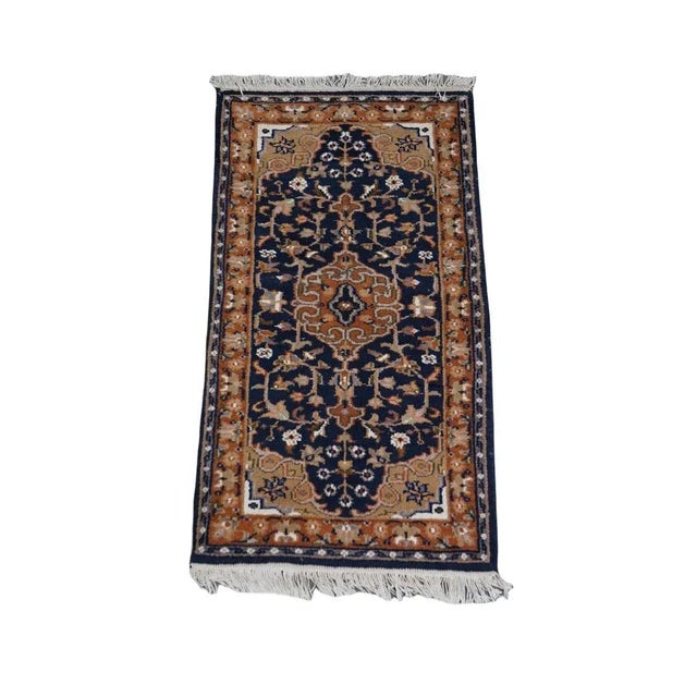 Thijs this beautiful mainly brown and blue tinted oriental rug 136x70cm. Let your home shine with this beautiful rug. It...