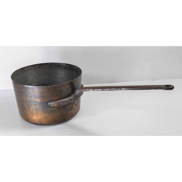 We are selling this nice 19th century Copper and hand wrought steel pan. This pan appears to be late 19th century and has...