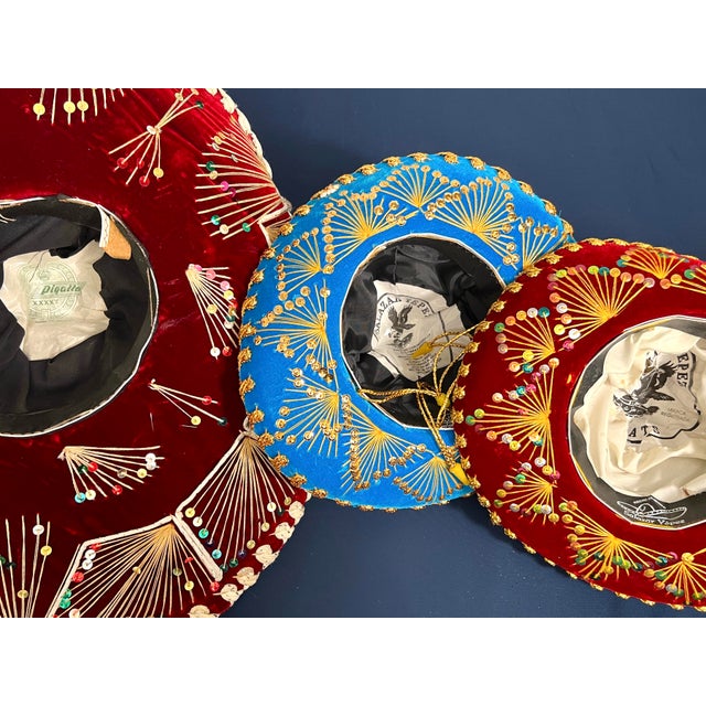 Stunning set of three vintage Mexican charro mariachi sombreros, curated as statement wall decor. Includes one large 20"...