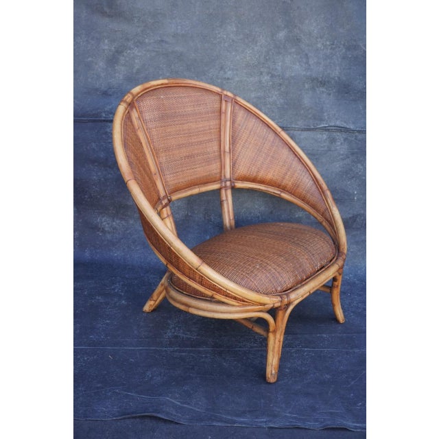 This beautiful bamboo and rattan loveseat from the Ramón Castellano for Kalma collection showcases the designer’s...