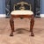 The Oval Mahogany Chippendale Bench is hand carved from solid, kiln dried, plantation grown mahogany and features an...