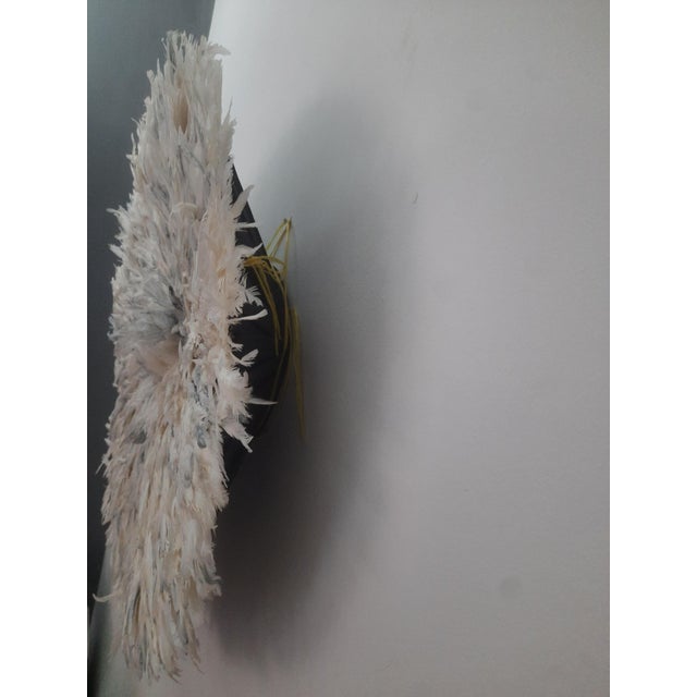 Juju hat white speckled grey of 31" (80 cm). Juju hat made with natural feathers and rattan. Juju hat woven and...