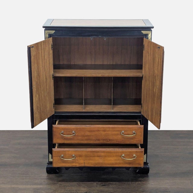 Two drawer, two door burl cabinet with inlay design of cranes and flowers. The cabinet has brass embellishments. Original...