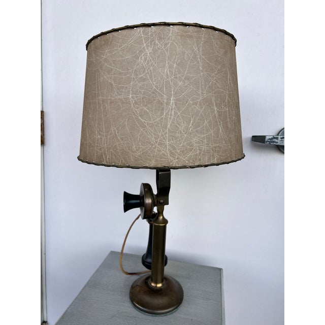 Add a brilliant dash of history and industrial character to your space with this unique table lamp, carefully upcycled...