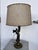 Add a brilliant dash of history and industrial character to your space with this unique table lamp, carefully upcycled...
