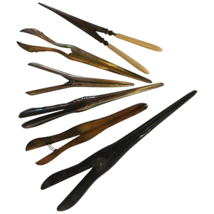 Six Assorted Metal and One Bakelite Antique Glove Stretchers Some Engraved