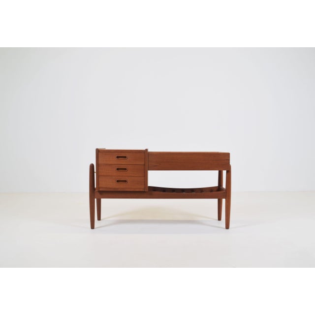 Mid-century furniture model 36, designed by Arne Wahl Iversen in 1961 and manufactured by Vinde Møbelfabric. This high-...