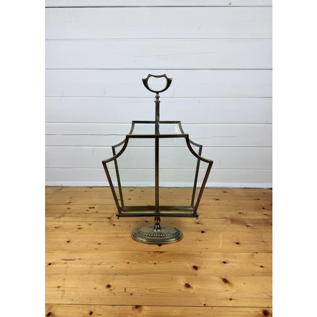 Vintage Hollywood Regency Magazine Rack in Brass and Glass, 1950s, in Flawless conditions. Designed 1950 to 1959