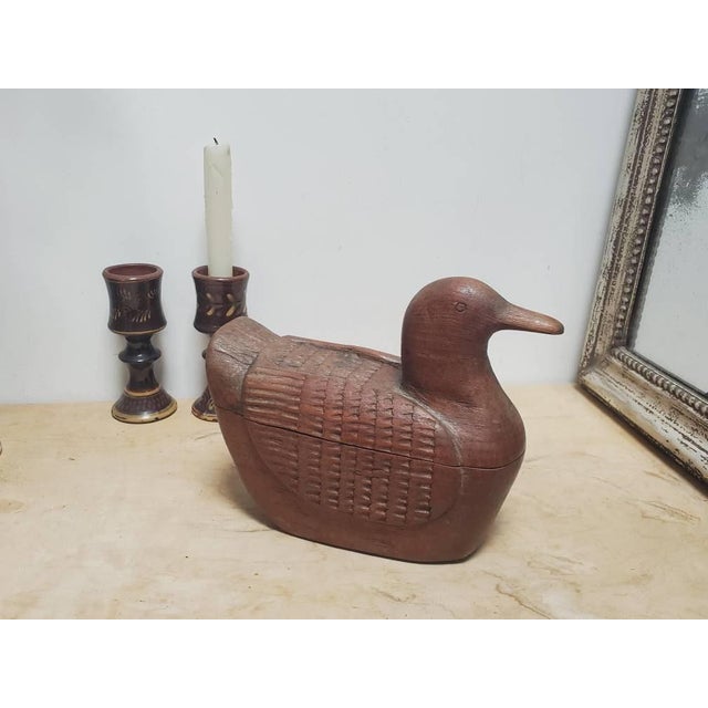 Unusual and striking vintage hand carved duck that is also a box. It would look great in a Scandinavian style home or in a...
