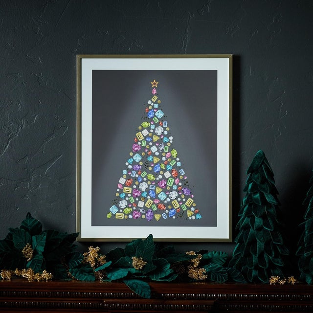 Add a touch of glamour to your holiday decor with the Holiday Jewel Tree Print Under Glass. Featuring chic wintry blue and...