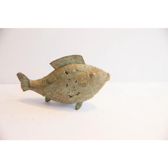 :: Vintage handmade African fish casting. Circa late mid 20th century, though possibly older, this piece has such...