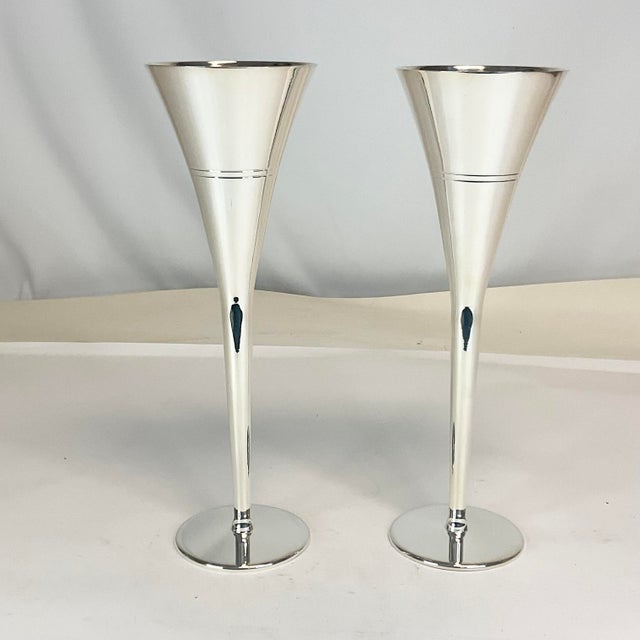 Offering a beautiful pair of Silver Plate Champagne Flutes. These were a 35th Wedding Anniversary gift to Mom and Dad....