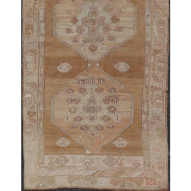 Measures: 5'1 x 12'5 Vintage Turkish Kars Gallery Runner with Geometric Medallions in Soft Earth Tones. Keivan Woven Arts...