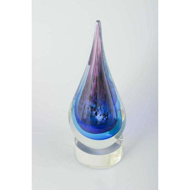 Murano Drop-shaped glass sculpture, 1970s. Handmade sculpture in clear glass with internal layers in blue and violet hues,...