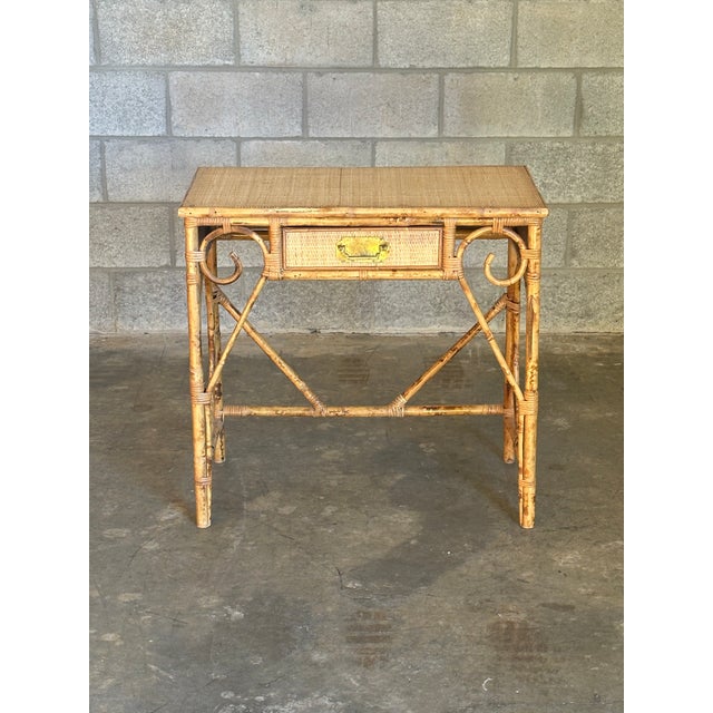 Beautiful burnt bamboo, cane, and rattan small desk, vanity, or console. Nice size would allow for a variety of uses....
