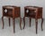 A pair of Louis XV style Country French side tables or nightstands made of solid walnut, with open niche and pierced...