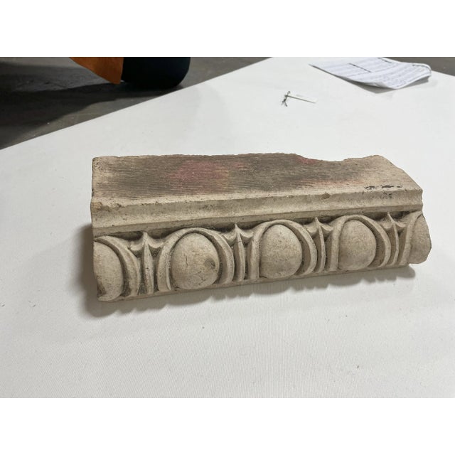 Architectural remnant with egg and dart design. Date is unknown but egg and dart motif originated with classical...