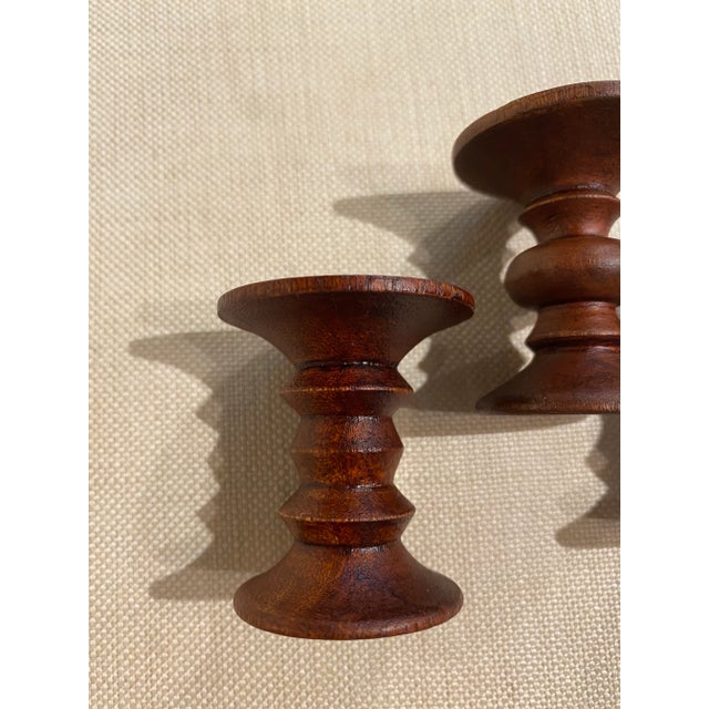 Trio of 1/6 scale replicas of the original Ray and Charles Eames walnut stools made for the Time-Life Building in New...