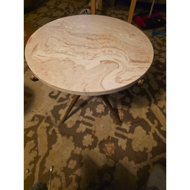 An exceptional and rare find for mid-century modern design enthusiasts. This authentic 1960s sculptural accent table...