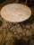 An exceptional and rare find for mid-century modern design enthusiasts. This authentic 1960s sculptural accent table...