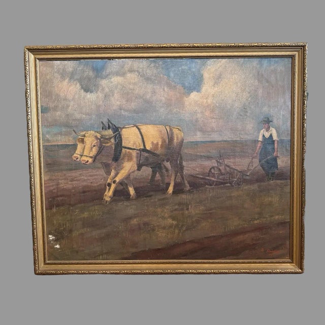 Antique oil painting landscape on board depicts worker in the field plowing with oxen, fluffy white clouds and blue sky...