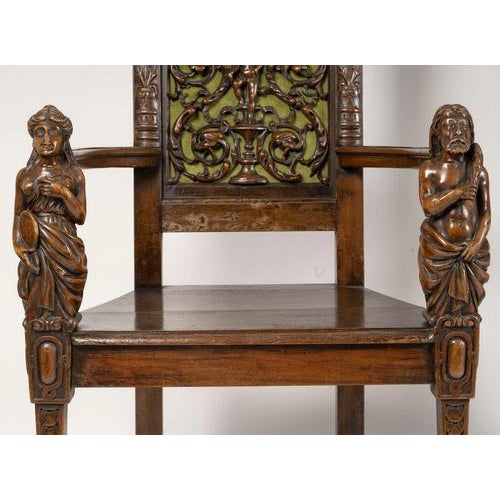 Pair of Neo-Renaissance-style armchairs, circa 1860, 19th century. Pair of carved walnut armchairs, circa 1860, Neo-...