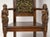 Pair of Neo-Renaissance-style armchairs, circa 1860, 19th century. Pair of carved walnut armchairs, circa 1860, Neo-...
