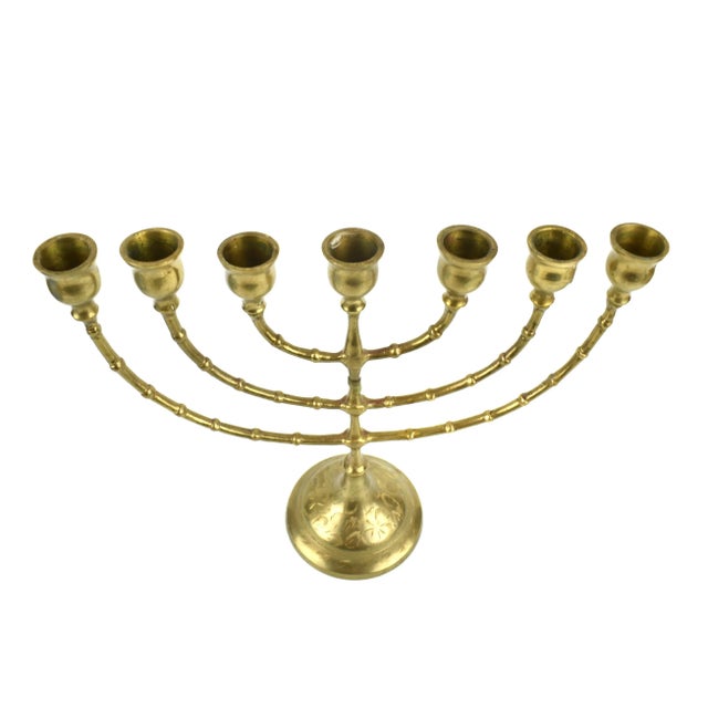 Stunning solid gold brass 7 branches Menorah Candle holder with hand engraved floral design. It will add character and...