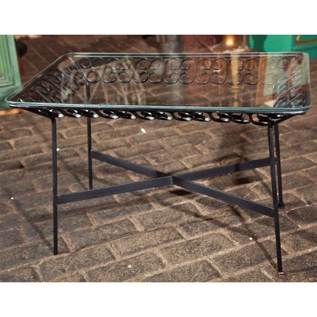 Small wrought iron side table from the Grenada collection designed by Arthur Umanoff and manufactured by Boyuer Scott...