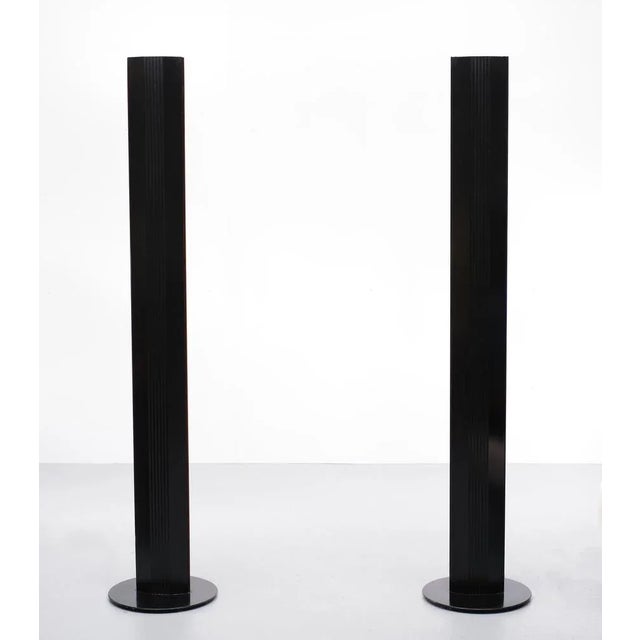 Two identical Halogen floor lamp. Black aluminum base. 1980s Italy. Foot switch. European Plug (up to 250V).The wiring of...
