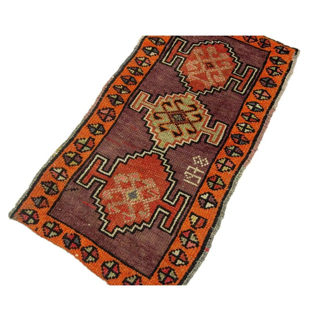 Vintage Handknotted decorative mini rug from Kars region of Turkey. Approximately 45-55 years old. In very good condition.