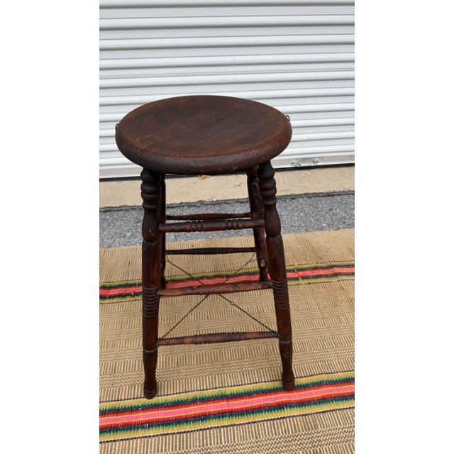 A Neat Antique Oak Workbench Barstool, With Wire Repairs, Circa 1890’s Made in the USA, circa 1880-1900 Made from Oak...