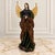 A striking late 20th century Christmas angel, standing an impressive 30 inches tall and beautifully dressed in layers of...