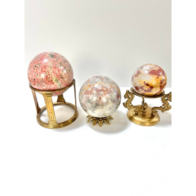 As wonderful instant collection that look collected. I believe the stone is marble. They’re quite heavy. All three stands...