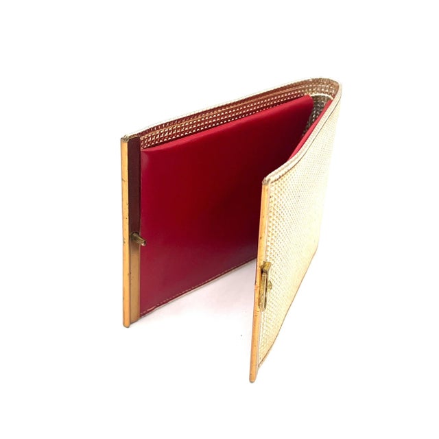 Vintage top grain cowhide leather wallet with brass clip. Gold exterior and red interior. Display this beautiful vintage...