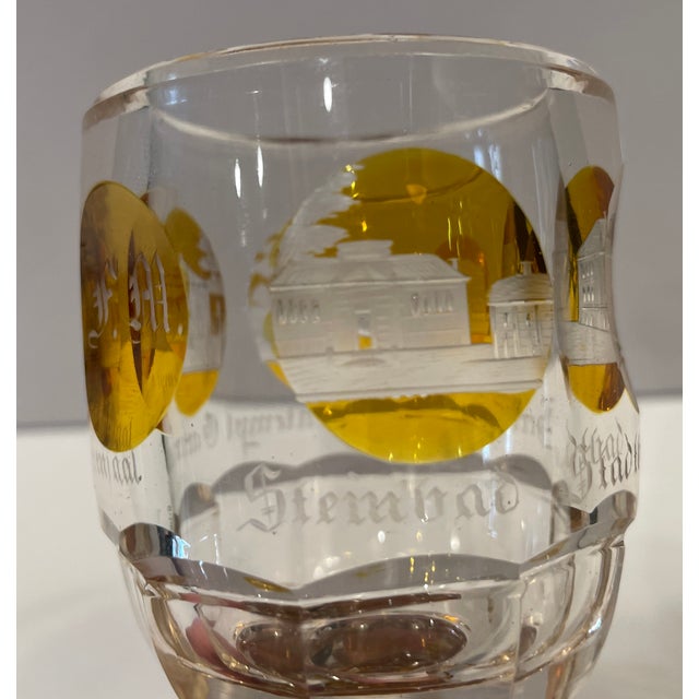 19th century clear and amber colored Bohemian cordial / wine glass. Colorless stem with amber medallions engraved with the...