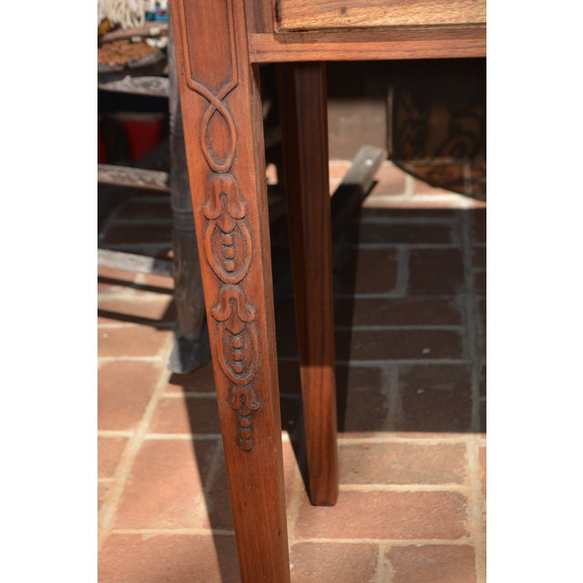 This is a sturdy wooden sideboard or desk! Purchased in England. I was told the wood is mainly walnut. 2 small over one...