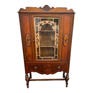 Early 20th Century Jacobean Revival Style Walnut Display China Cabinet For Sale