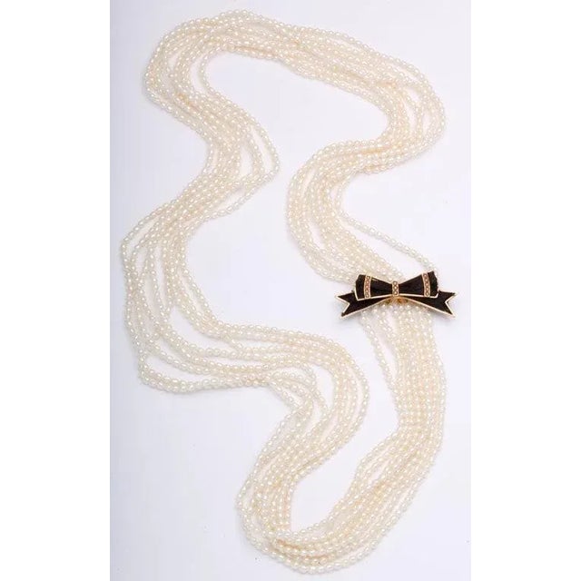 This piece reminds me of Chanel. The Victorian bow brooch and the necklace can be worn together or seperately. The bow has...