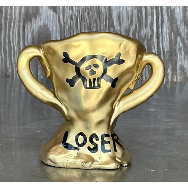 This vintage ceramic loser trophy is a delightfully irreverent piece of decorative art with a wicked sense of humor. Hand-...