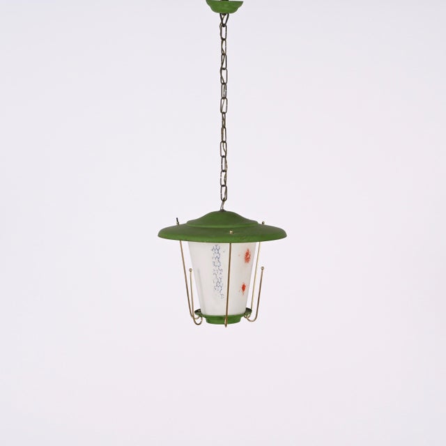 Amazing mid-century round opaline glass and brass green lantern chandelier. This fantastic piece was designed in Italy...