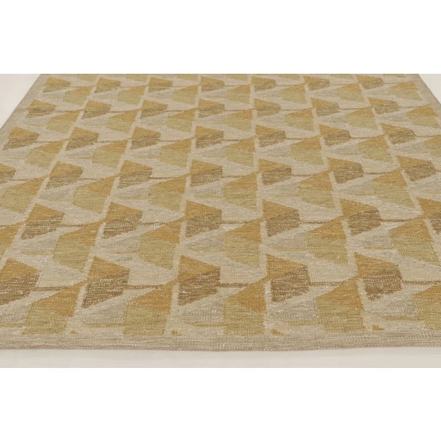 This approximately 9x12 Scandinavian rug is a sophisticated addition to Rug & Kilim’s flatweave collection—a beautifully...