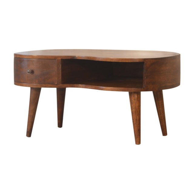 Sculpted curves, rounded edges, and Nordic legs define this chestnut coffee table. An open slot and a single drawer (with...