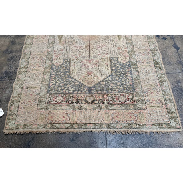 Antique Turkish silk rug, circa 1850, finely handwoven and showcasing an elegant architectural niche design inspired by...