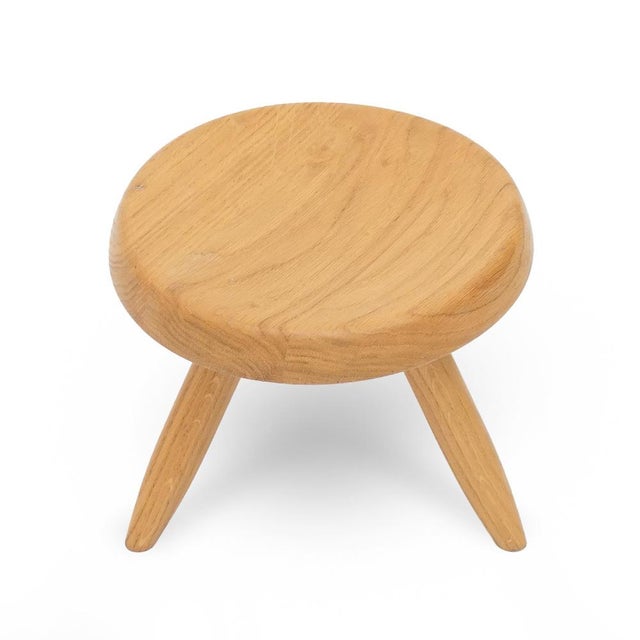 Designed by Charlotte Perriand in the 1950s, the Tabouret Berger stool embodies her vision of balance between...