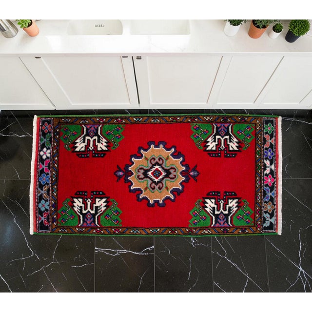 This exquisite hand-knotted Kirsehir rug is a vibrant example of Central Anatolian artistry from the 1970s. Its compact...