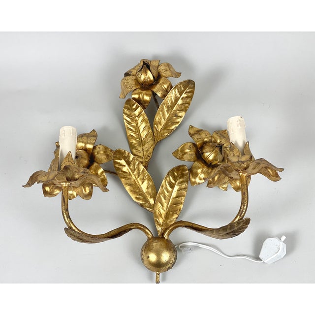 Vintage wall sconce for two light bulbs with an original base and beautiful decorative floral elements. Beautiful Bronze...