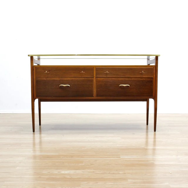 This stunning mid-century dresser vanity was produced by Wrighton Furniture during the 1950s. A classy looking modernist...